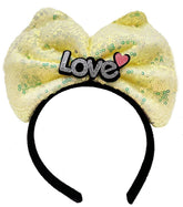 Nessiworld Couronne lumineuse à LED avec 3 fonctions différentes, inscription Love argentée et nœud jaune, 20 x 17 cm